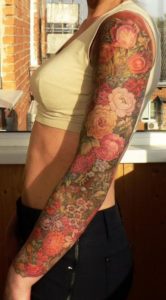 color-flowers-sleeve-tattoo